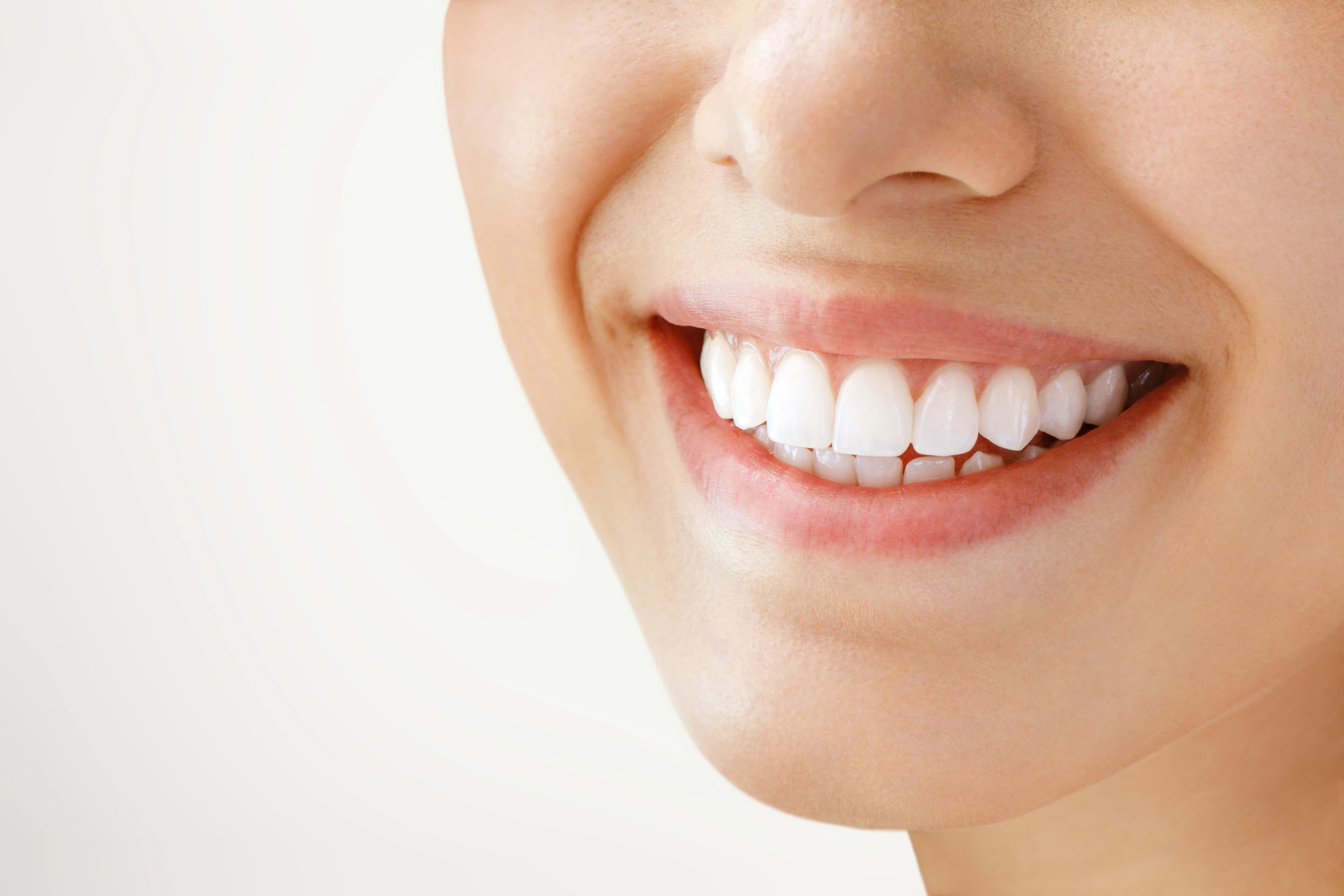 Patient with a brighter smile after teeth whitening in Banff